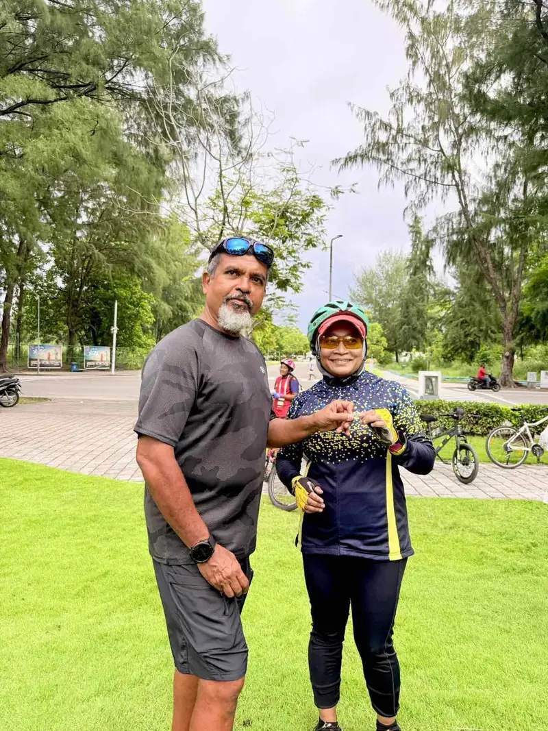 Riders receiving merit badge pins at Hulhumalé Central Park