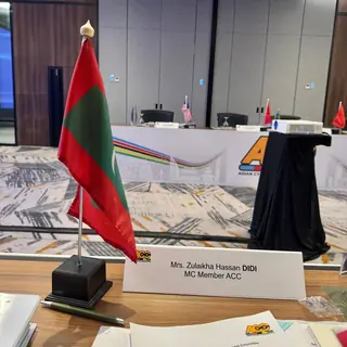 Nameplate reading Mrs. Zulaikha Hassan Didi, MC Member ACC
