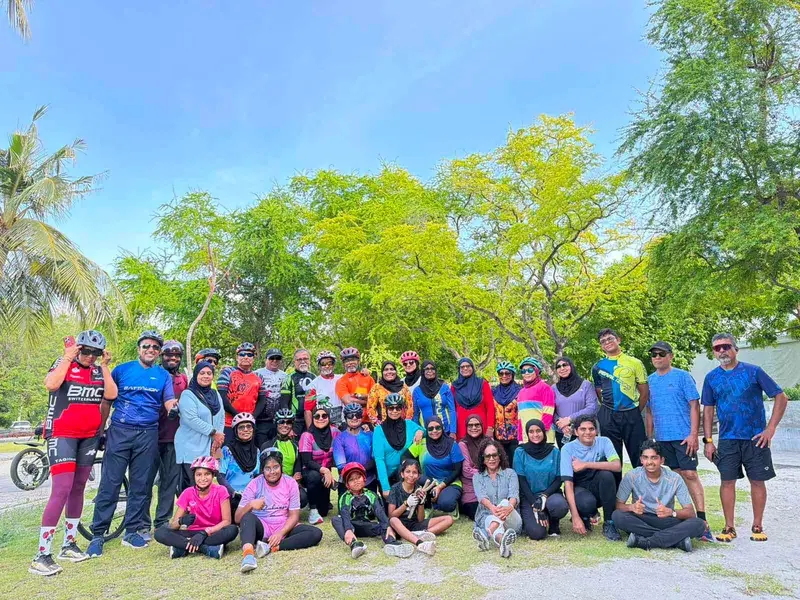Friday ride group under a blue sky