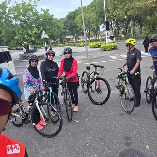 Small group of riders ready to set off on the road